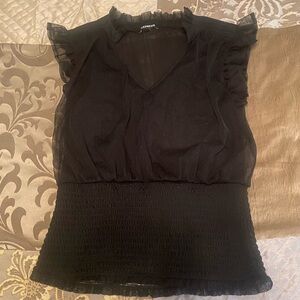 Express sleeveless top with smocked waist band and sheer back
